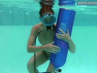 Hungarian looker fucks a dildo underwater
